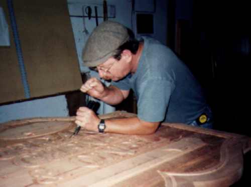 Dan, about 10 years and 30 lbs ago, with a hand carved wood sign!